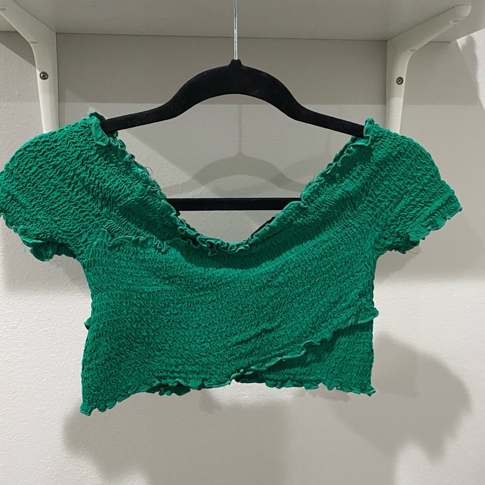 Green crop top.